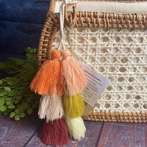 Crescent Woven Handbag with tassel detail and cinch bag interior - Picture 5 of 11